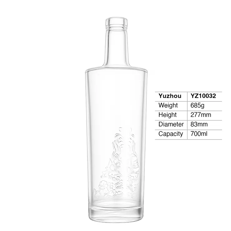 A 700ml round super flint glass spirit bottle featuring decorative floral embossing on the lower body and a thick, heavy glass base.