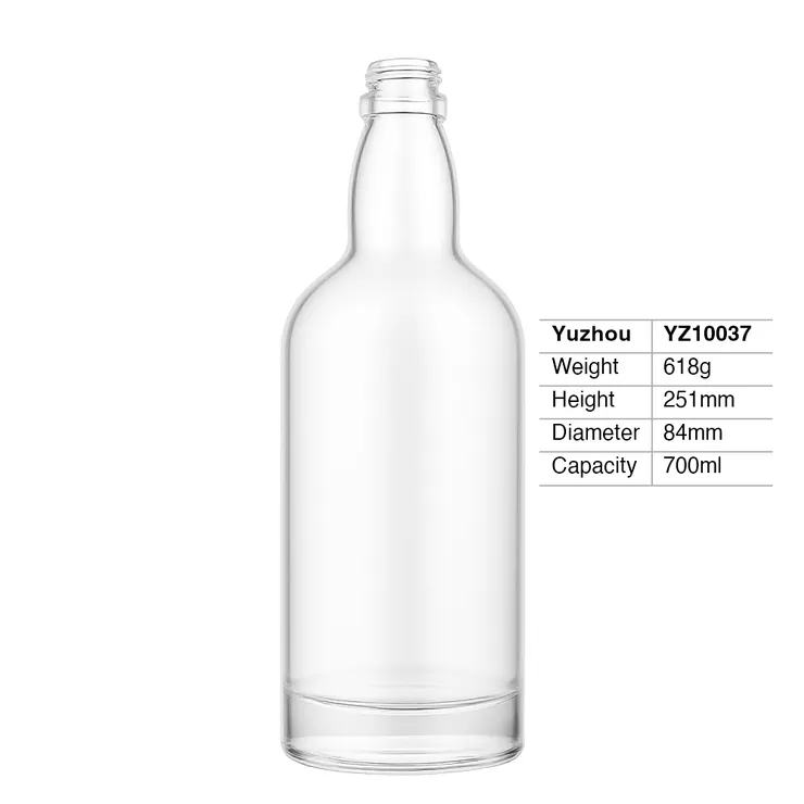 A 700ml round super flint glass spirit bottle featuring a bulbous neck, heavy base, and screw top finish for premium liquor brands.