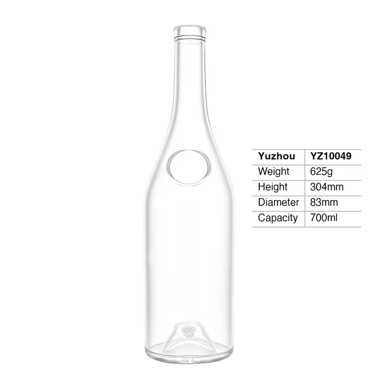 Yuzhou Glass 700ml crystal clear super flint round liquor bottle featuring a circular medallion indentation, high neck finish, and deep push-up base.